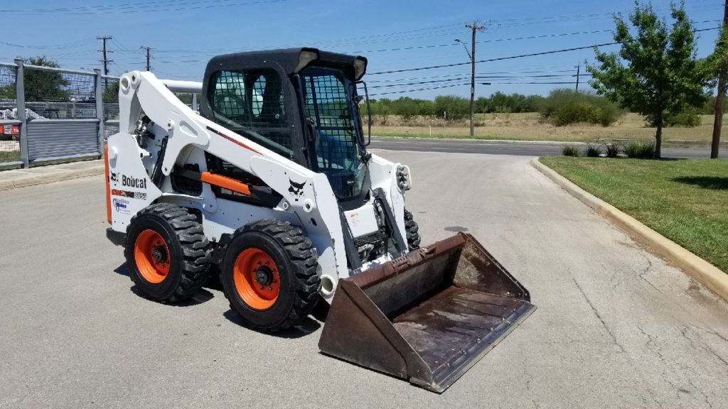 Бобкэт 650. Мини-погрузчик Bobcat s650. Минипогрузчик Бобкет s650. Бобкэт погрузчик s650 габариты.